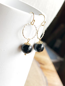 Faceted Black Earrings on Textured Circles